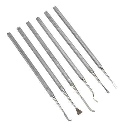 metal Carving Set 6 Piece Sharp Edge

Set of 6 stainless steel carving tools with sharp edges. Fabulous shapes for cleaning inside tight spots and carving and sculpting metal clay both wet and dry. Comfortable to hold. A dream to use with leather hard metal. Each tool is 7" long.