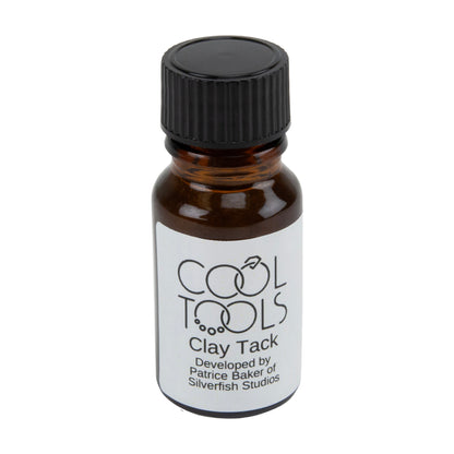 bottle of clay tack for stronger connections in metal clay