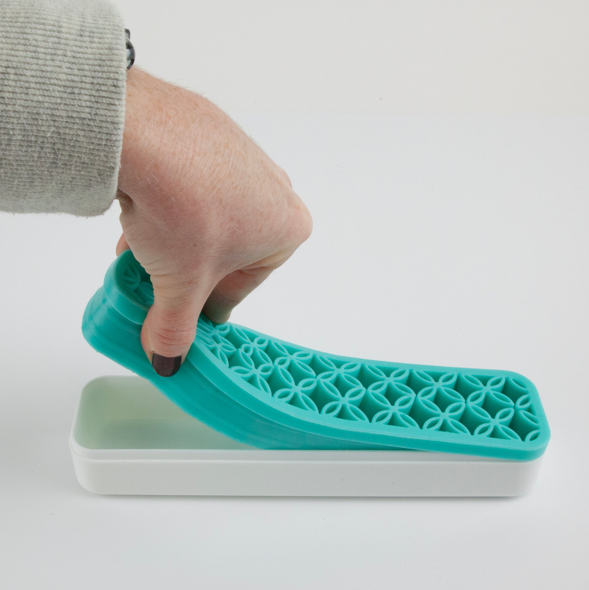 teal Silicone Tool Organizer separtating