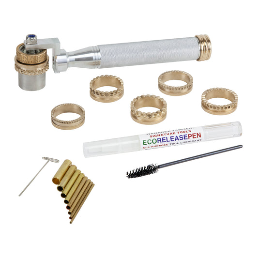 Wanaree Tanner Die Cut Rollers Set - Granulation Design Set

This complete die cut roller set is packaged with the entire collection of the "Granulation Strip Die Cut Rollers" including 2.0mm Granulation, 2.5mm Granulation, 3.0mm Granulation, 3.5 Granulation, 4.0 Granulation and 5.0 Granulation rollers. Also included is a Die Cut Roller Handle, 2.8ml Eco-Release Pen, an applicator brush and a Calibrated Cutters in a metal storage container featuring rolling card and reference guides.