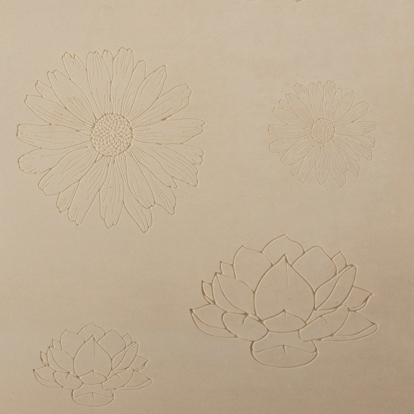 Jewelry Artist Elements - Texture - Blooms

Second picture shown is an element of the texture in clay.

Embossed elements. Impress clay, then use a Jewelry Shape Template for the shape or cut out with a needle tool. Jewelry Artist Elements are flexible, washable and can be used with any soft clay. Spritz with CoolSlip or dust on Dry Powder Release for stick-free impressions when using metal clay and polymer clay.

These beautiful texture sheets feature designs that are perfect for making many different jewe