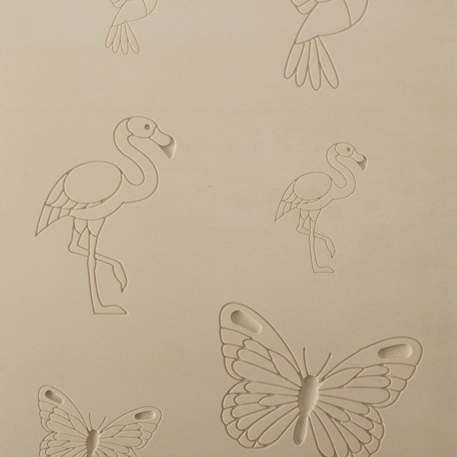 Jewelry Artist Elements - Texture - Flying Creatures 3

Second picture shown is an element of the texture in clay.

Embossed elements. Impress clay, then use a Jewelry Shape Template for the shape or cut out with a needle tool. Jewelry Artist Elements are flexible, washable and can be used with any soft clay. Spritz with CoolSlip or dust on Dry Powder Release for stick-free impressions when using metal clay and polymer clay.

These beautiful texture sheets feature designs that are perfect for making many di