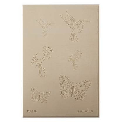 Jewelry Artist Elements - Texture - Flying Creatures 3

Second picture shown is an element of the texture in clay.

Embossed elements. Impress clay, then use a Jewelry Shape Template for the shape or cut out with a needle tool. Jewelry Artist Elements are flexible, washable and can be used with any soft clay. Spritz with CoolSlip or dust on Dry Powder Release for stick-free impressions when using metal clay and polymer clay.

These beautiful texture sheets feature designs that are perfect for making many di