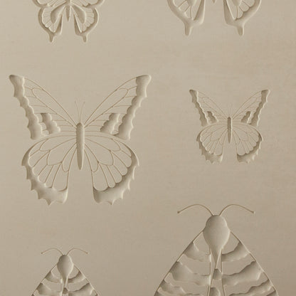Jewelry Artist Elements - Texture - Butterfly 4

Second picture shown is an element of the texture in clay.

Embossed elements. Impress clay, then use a Jewelry Shape Template for the shape or cut out with a needle tool. Jewelry Artist Elements are flexible, washable and can be used with any soft clay. Spritz with CoolSlip or dust on Dry Powder Release for stick-free impressions when using metal clay and polymer clay.

These beautiful texture sheets feature designs that are perfect for making many different