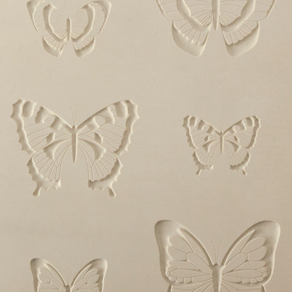 Jewelry Artist Elements - Texture - Butterfly 5

Second picture shown is an element of the texture in clay.

Embossed elements. Impress clay, then use a Jewelry Shape Template for the shape or cut out with a needle tool. Jewelry Artist Elements are flexible, washable and can be used with any soft clay. Spritz with CoolSlip or dust on Dry Powder Release for stick-free impressions when using metal clay and polymer clay.

These beautiful texture sheets feature designs that are perfect for making many different