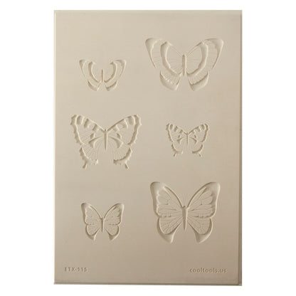 Jewelry Artist Elements - Texture - Butterfly 5

Second picture shown is an element of the texture in clay.

Embossed elements. Impress clay, then use a Jewelry Shape Template for the shape or cut out with a needle tool. Jewelry Artist Elements are flexible, washable and can be used with any soft clay. Spritz with CoolSlip or dust on Dry Powder Release for stick-free impressions when using metal clay and polymer clay.

These beautiful texture sheets feature designs that are perfect for making many different