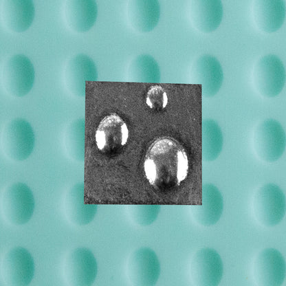 green silicone Finishing Touches Mold - Oval Domed with silver sample
