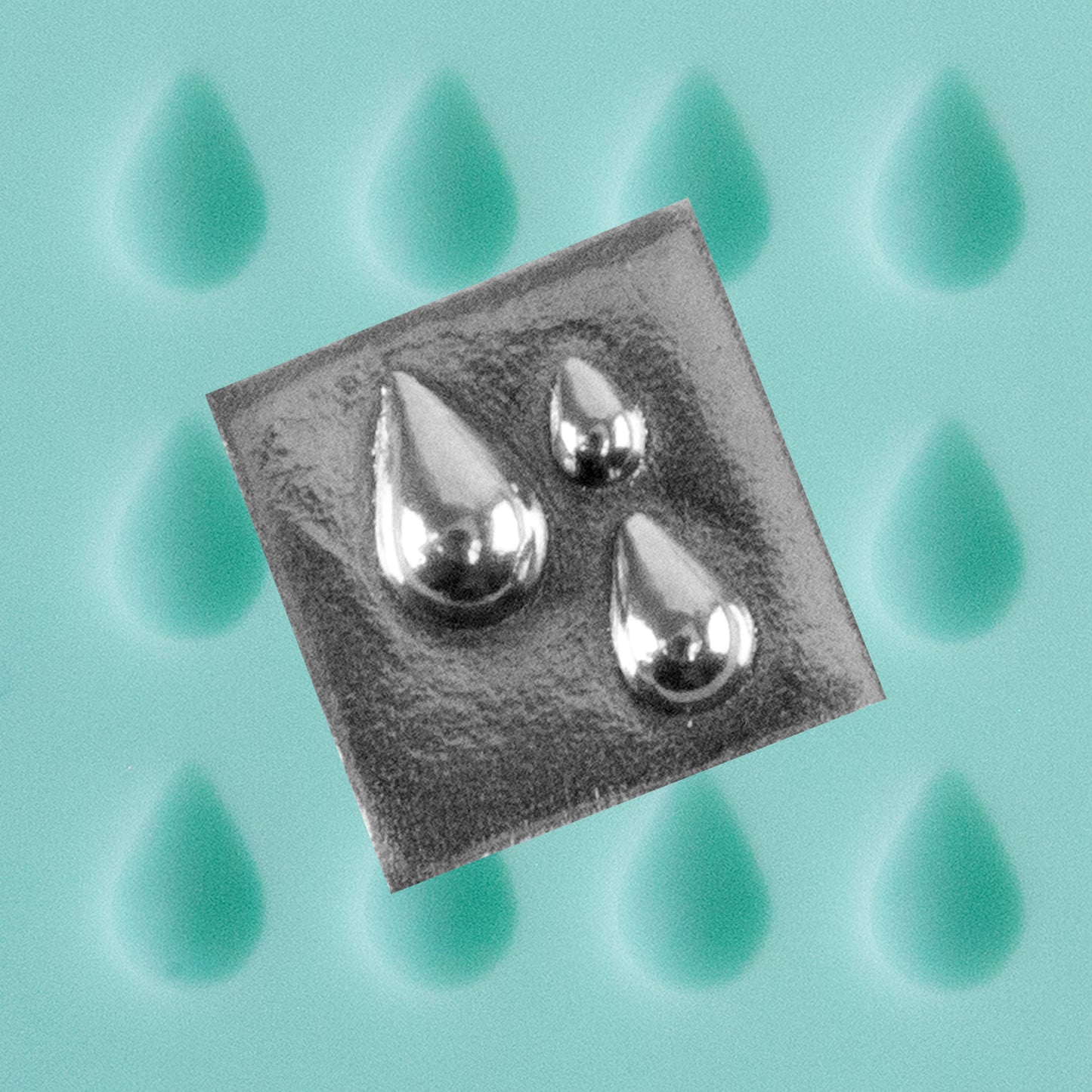 green silicone Finishing Touches Mold - Teardrop with silver sample