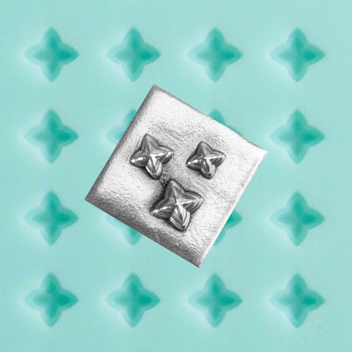 green silicone Finishing Touches Mold - Guardians Star with silver sample