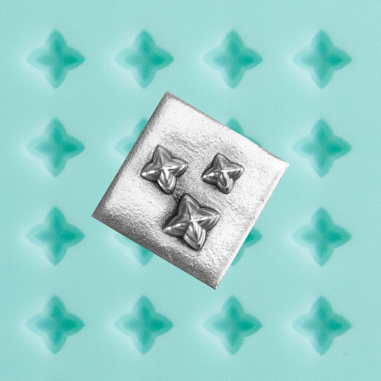 green silicone Finishing Touches Mold - Guardians Star with silver sample