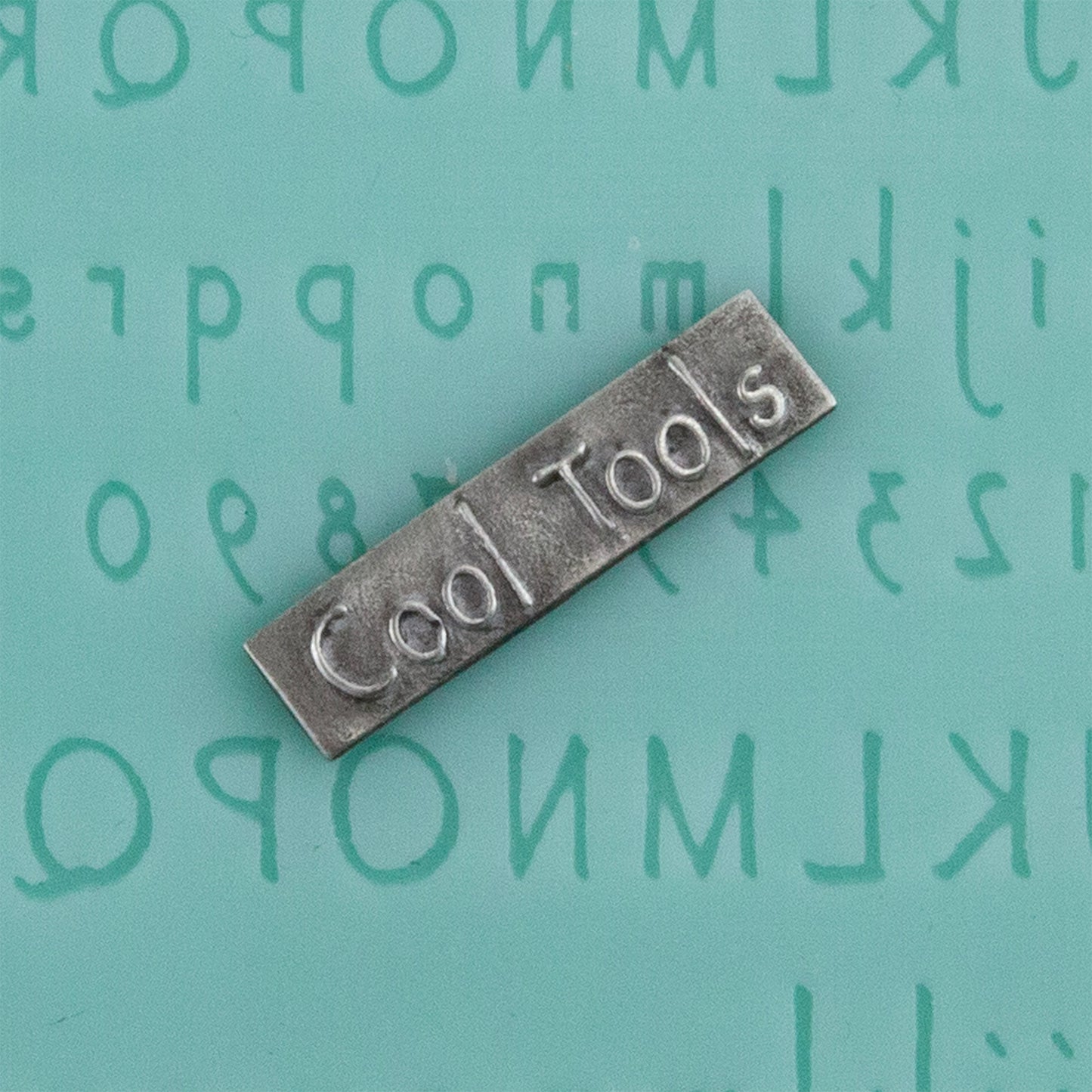 green silicone Finishing Touches Mold - Alphabet 6 - Flat with silver sample