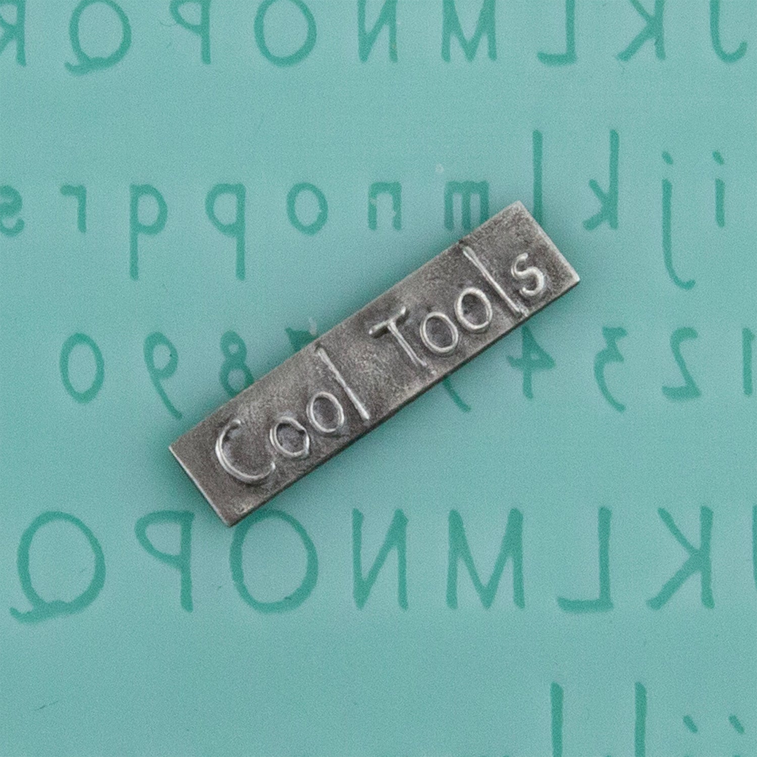 green silicone Finishing Touches Mold - Alphabet 6 - Flat with silver sample