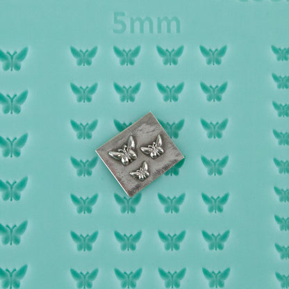 green silicone Finishing Touches Mold - Butterfly 1 with silver sample