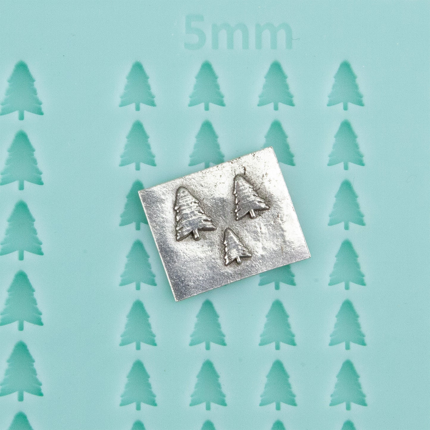 green silicone Finishing Touches Mold - Tree 1 with silver sample