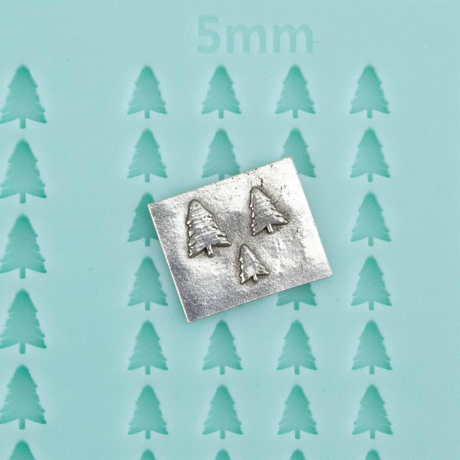 green silicone Finishing Touches Mold - Tree 1 with silver sample