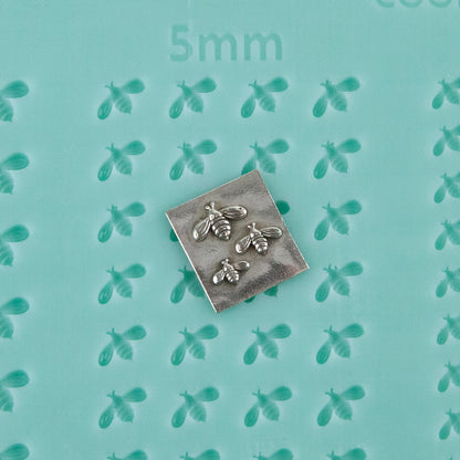 green silicone Finishing Touches Mold - Bee with silver sample
