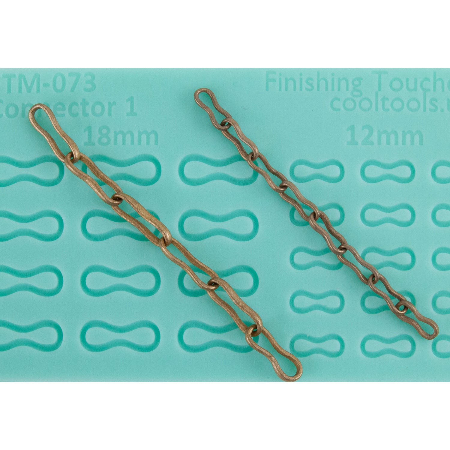 green silicone Finishing Touches Mold - Connector 1 with bronze samples