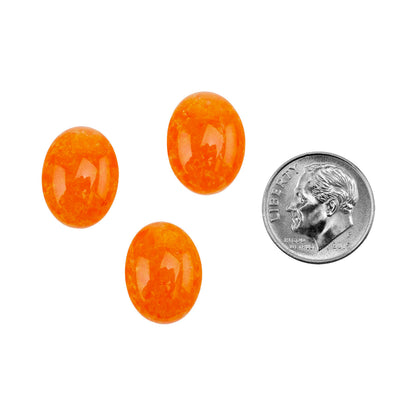 oval Colored Glass Cabochon - Orange Speckle with dime
