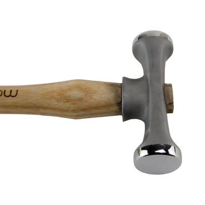 Fretz - Maker Planishing Hammer

The Maker Planishing Hammer has a slightly rounded working end for smoothing and hardening metal. The rounded end gives the classic planishing mark found on handwrought metal. The other working end is flat which can refine the round planishing marks to near smoothness.
Each hammer in the Maker line is made with a signature 420 stainless steel and have polished faces ready for use. The handles are North American ash with the logo on the handle.