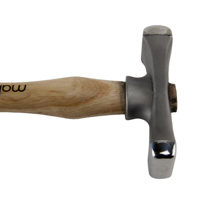 Fretz - Maker Wide Raising Hammer

The Maker Wide Raising Hammer is useful for raising small vessels or bowls from flat stock. It is also a forging hammer used to draw out wire or thin sheet metal. It creates seamless forms with no thinning—perfect for hammering concave curves.
Each hammer in the Maker line is made with a signature 420 stainless steel and have polished faces ready for use. The handles are North American ash with the logo on the handle.