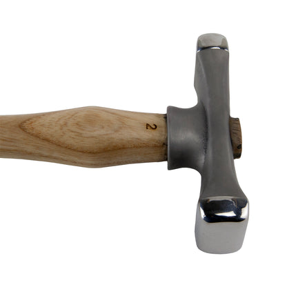 Fretz - Maker Wide Raising Hammer

The Maker Wide Raising Hammer is useful for raising small vessels or bowls from flat stock. It is also a forging hammer used to draw out wire or thin sheet metal. It creates seamless forms with no thinning—perfect for hammering concave curves.
Each hammer in the Maker line is made with a signature 420 stainless steel and have polished faces ready for use. The handles are North American ash with the logo on the handle.