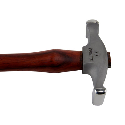 Fretz Wide Raising Hammer&nbsp;

The Wide Raising Hammer can be used to raise sheet metal into a bowl against a wooden stake or a metal T-stake. Is is also useful for raising in cylinders to form a concave shape. This hammer also makes it possible to planish subtle concave shapes. Made of 420 stainless steel and Padauk wood.