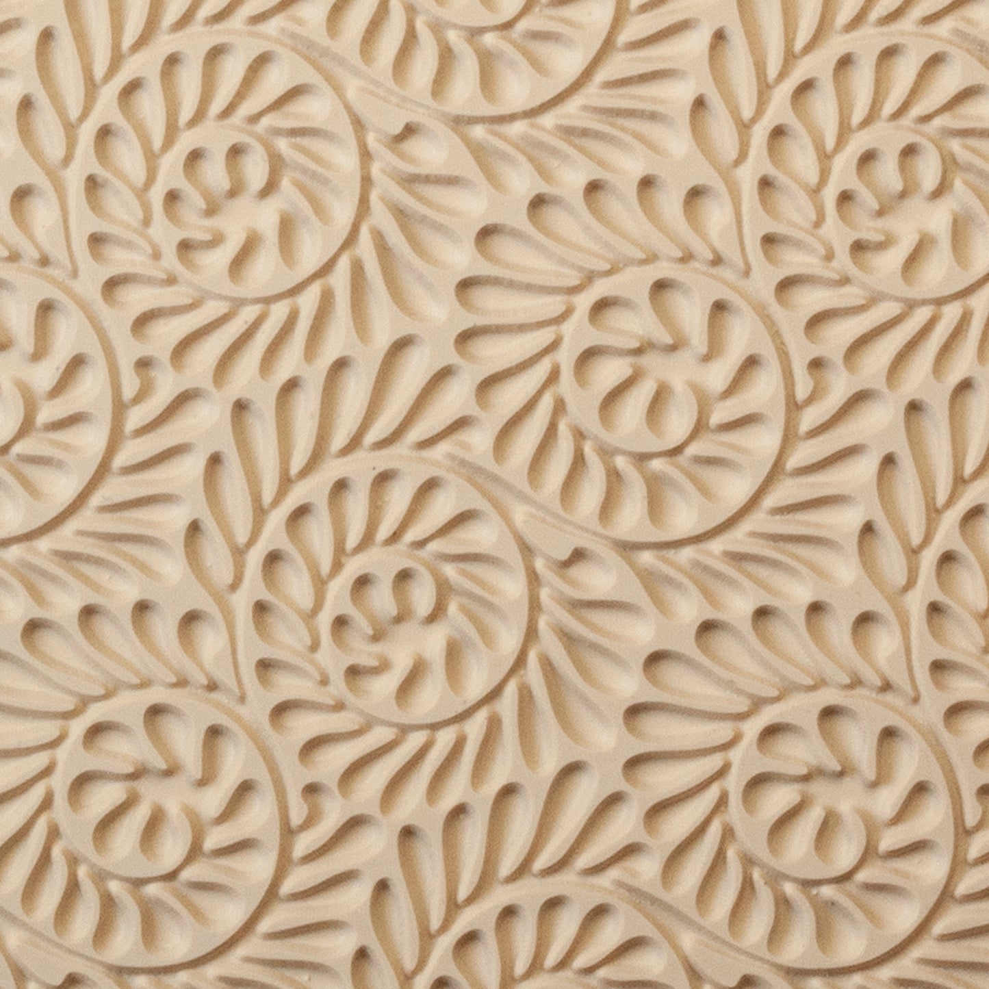 Mega Texture Tile - Fiddlehead Fern Embossed. Use to impress texture in soft clays. Mega Texture Tiles are perfect for projects both large and small. Mega Tiles measure 9-1/4" x 6" and are about 7 times larger than Texture Tiles. These textures are flexible, washable and can be used with any soft clay.