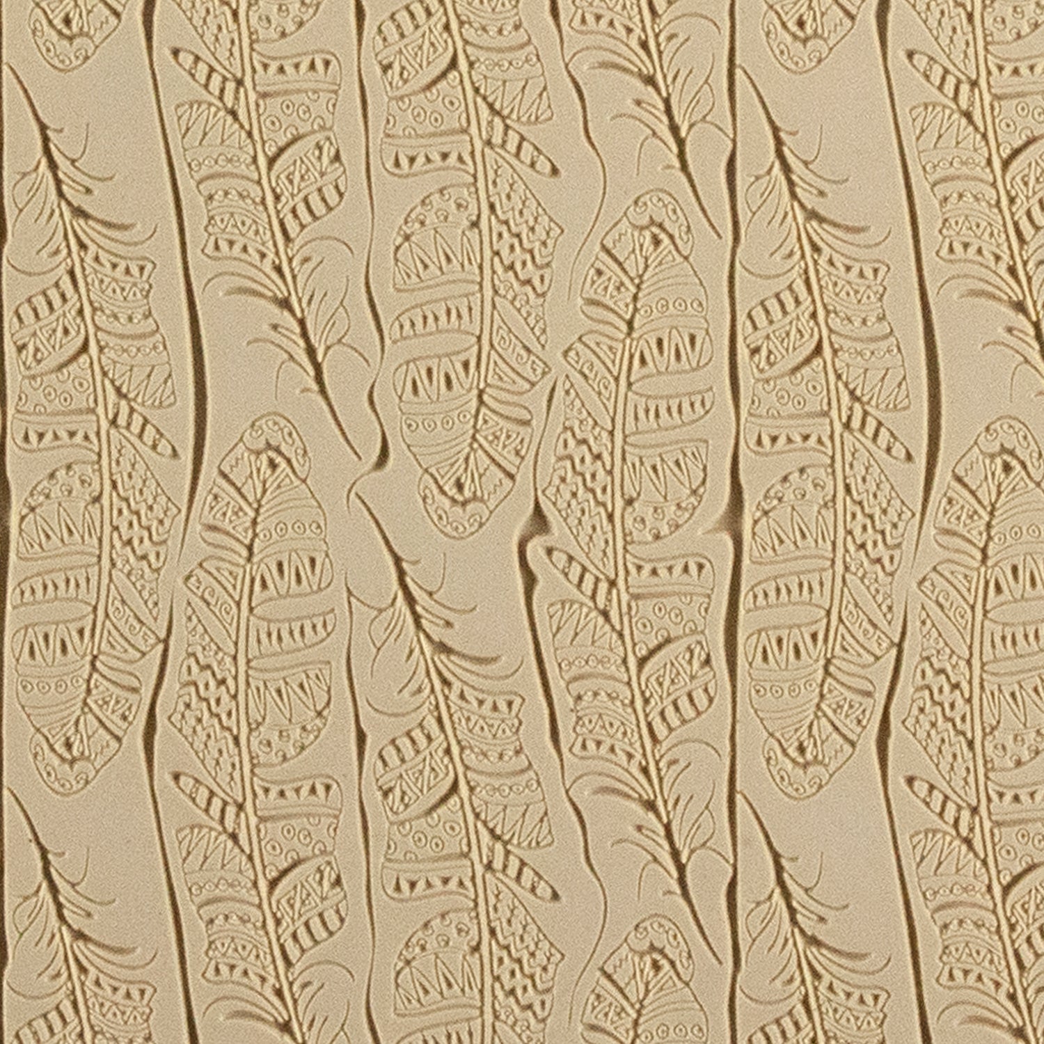 Mega Texture Tile - Tribal Feather Fineline. Use to impress texture in soft clays. Mega Texture Tiles are perfect for projects both large and small. Mega Tiles measure 9-1/4" x 6" and are about 7 times larger than Texture Tiles. These textures are flexible, washable and can be used with any soft clay.