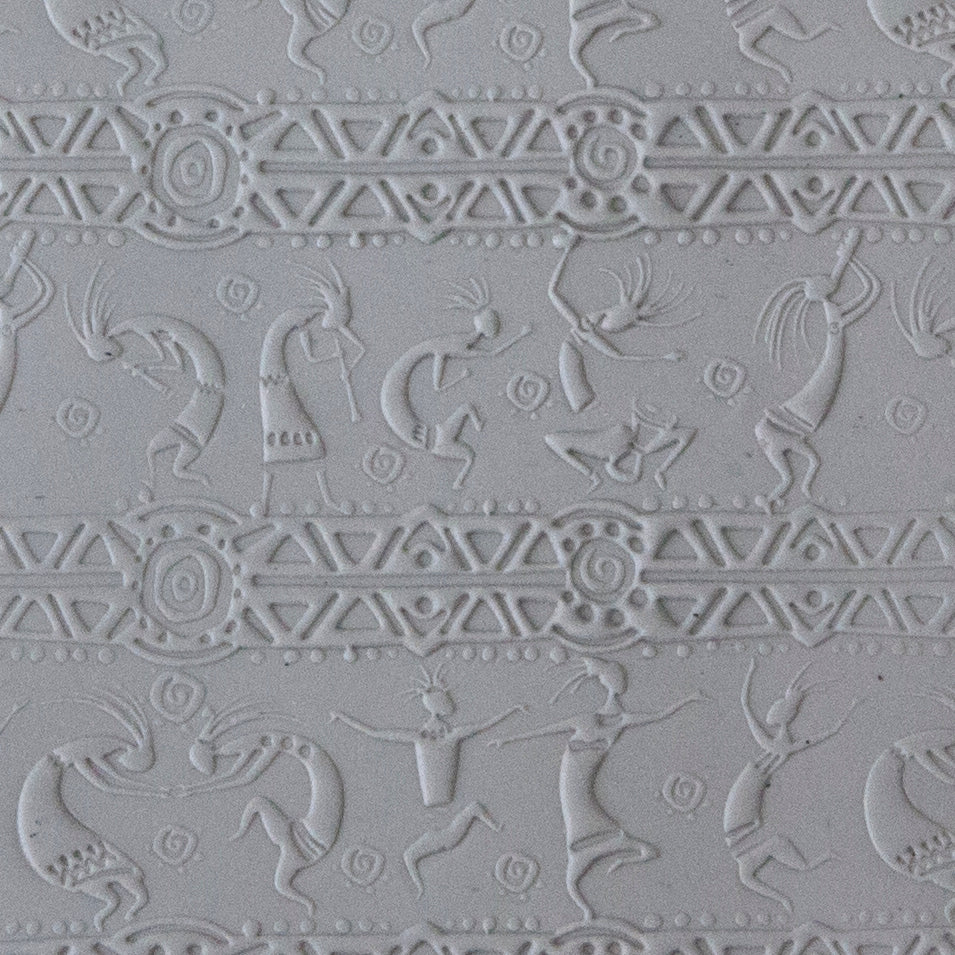 sample in clay Mega Texture Tile - Dancing Spirits Fineline. Use to impress texture in soft clays. Mega Texture Tiles are perfect for projects both large and small. Mega Tiles measure 9-1/4" x 6" and are about 7 times larger than Texture Tiles. These textures are flexible, washable and can be used with any soft clay.