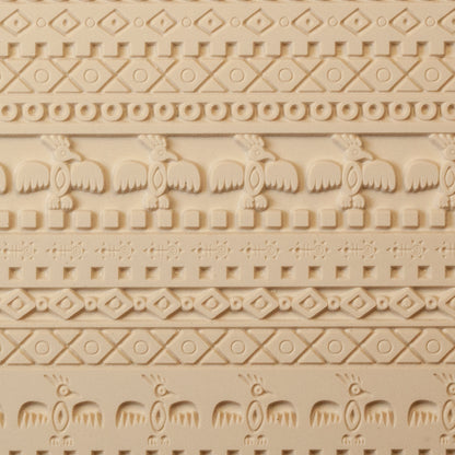 Mega Texture Tile - Tribal Spirits. Use to impress texture in soft clays. Mega Texture Tiles are perfect for projects both large and small. Mega Tiles measure 9-1/4" x 6" and are about 7 times larger than Texture Tiles. These textures are flexible, washable and can be used with any soft clay.