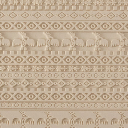 Mega Texture Tile - Tribal Spirits Embossed. Use to impress texture in soft clays. Mega Texture Tiles are perfect for projects both large and small. Mega Tiles measure 9-1/4" x 6" and are about 7 times larger than Texture Tiles. These textures are flexible, washable and can be used with any soft clay.