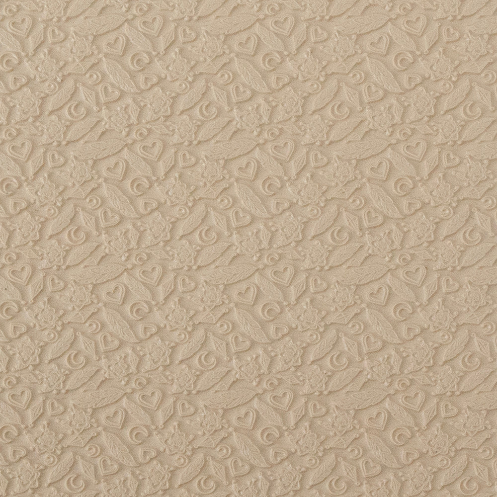 Mega Texture Tile - Lucky Charms. Use to impress texture in soft clays. Mega Texture Tiles are perfect for projects both large and small. Mega Tiles measure 9-1/4" x 6" and are about 7 times larger than Texture Tiles. These textures are flexible, washable and can be used with any soft clay.