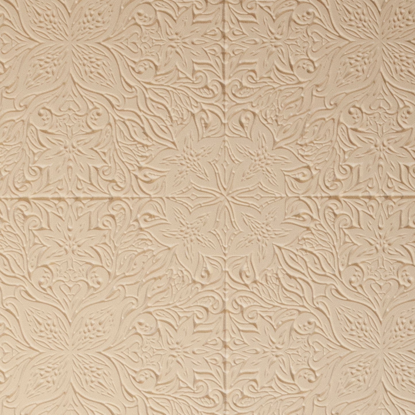 Mega Texture Tile - Woodcut Floral. Use to impress texture in soft clays. Mega Texture Tiles are perfect for projects both large and small. Mega Tiles measure 9-1/4" x 6" and are about 7 times larger than Texture Tiles. These textures are flexible, washable and can be used with any soft clay.