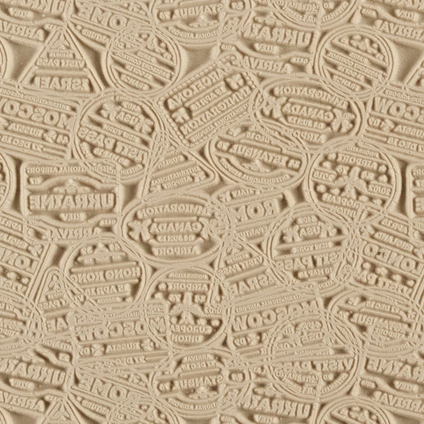 Mega Texture Tile - Bon Voyage. Use to impress texture in soft clays. Mega Texture Tiles are perfect for projects both large and small. Mega Tiles measure 9-1/4" x 6" and are about 7 times larger than Texture Tiles. These textures are flexible, washable and can be used with any soft clay.