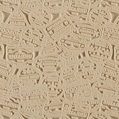 Mega Texture Tile - Bon Voyage. Use to impress texture in soft clays. Mega Texture Tiles are perfect for projects both large and small. Mega Tiles measure 9-1/4" x 6" and are about 7 times larger than Texture Tiles. These textures are flexible, washable and can be used with any soft clay.