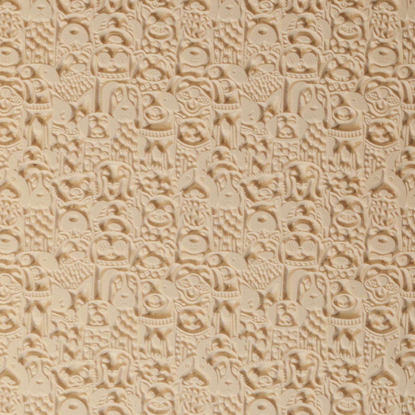 Mega Texture Tile - Canine Companions. Use to impress texture in soft clays. Mega Texture Tiles are perfect for projects both large and small. Mega Tiles measure 9-1/4" x 6" and are about 7 times larger than Texture Tiles. These textures are flexible, washable and can be used with any soft clay.