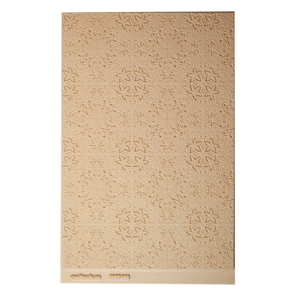 Mega Texture Tile - Woodcut Floral Embossed. Use to impress texture in soft clays. Mega Texture Tiles are perfect for projects both large and small. Mega Tiles measure 9-1/4" x 6" and are about 7 times larger than Texture Tiles. These textures are flexible, washable and can be used with any soft clay.