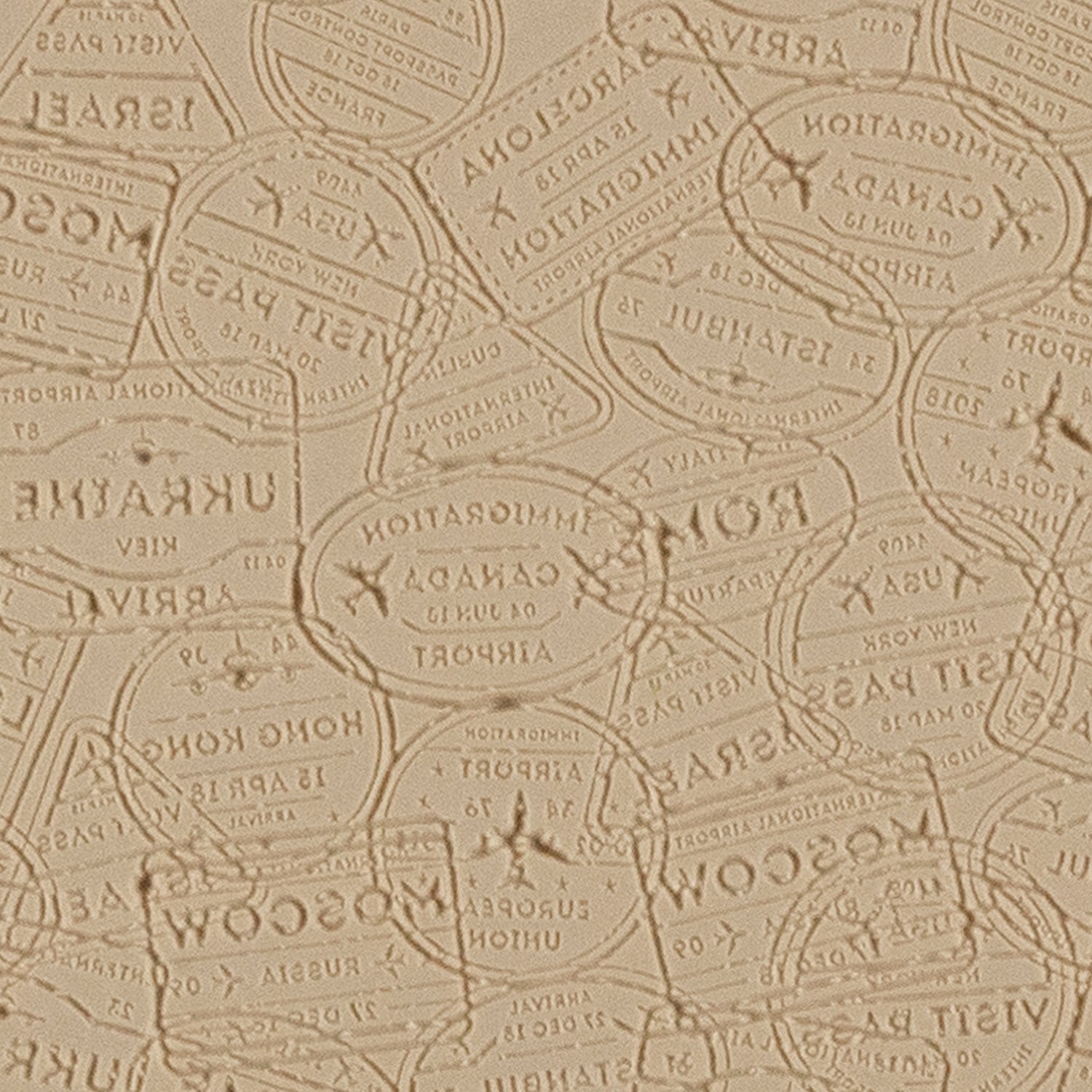 Mega Texture Tile - Bon Voyage Embossed. Use to impress texture in soft clays. Mega Texture Tiles are perfect for projects both large and small. Mega Tiles measure 9-1/4" x 6" and are about 7 times larger than Texture Tiles. These textures are flexible, washable and can be used with any soft clay.