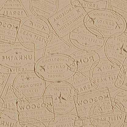 Mega Texture Tile - Bon Voyage Embossed. Use to impress texture in soft clays. Mega Texture Tiles are perfect for projects both large and small. Mega Tiles measure 9-1/4" x 6" and are about 7 times larger than Texture Tiles. These textures are flexible, washable and can be used with any soft clay.