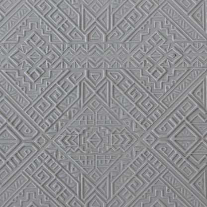sample in clay of Mega Texture Tile - Navajo Rug Embossed. Use to impress texture in soft clays. Mega Texture Tiles are perfect for projects both large and small. Mega Tiles measure 9-1/4" x 6" and are about 7 times larger than Texture Tiles. These textures are flexible, washable and can be used with any soft clay.