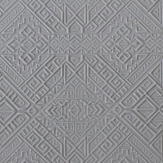 sample in clay of Mega Texture Tile - Navajo Rug Embossed. Use to impress texture in soft clays. Mega Texture Tiles are perfect for projects both large and small. Mega Tiles measure 9-1/4" x 6" and are about 7 times larger than Texture Tiles. These textures are flexible, washable and can be used with any soft clay.