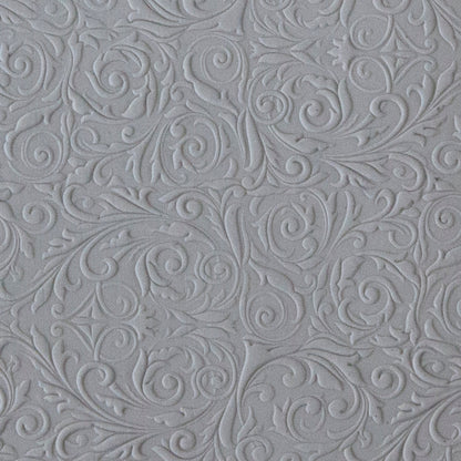 sample in clay of Mega Texture Tile - Damask. Use to impress texture in soft clays. Mega Texture Tiles are perfect for projects both large and small. Mega Tiles measure 9-1/4" x 6" and are about 7 times larger than Texture Tiles. These textures are flexible, washable and can be used with any soft clay.