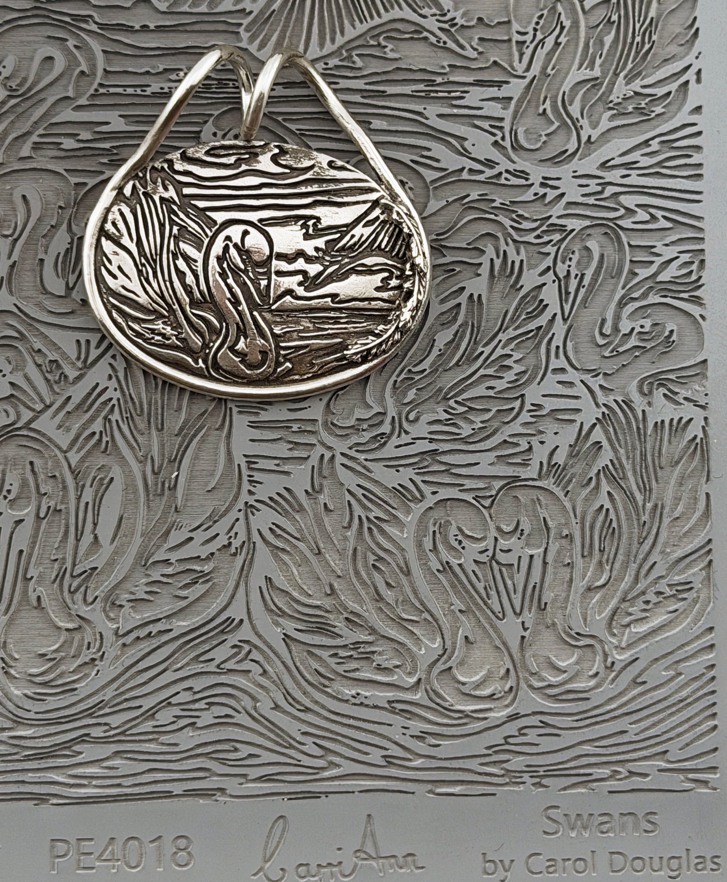 Carol Douglas Texture Mat - Swans - Cool Tools