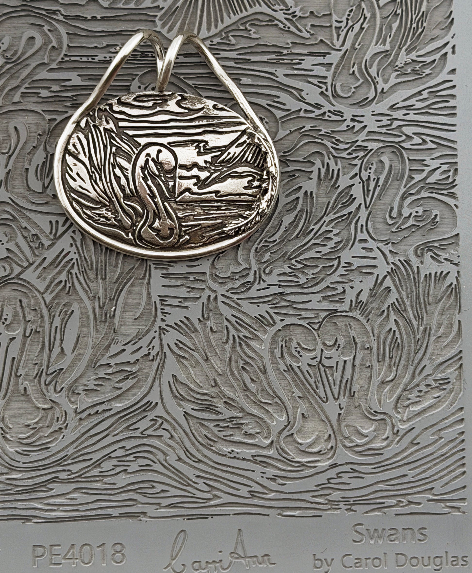 Carol Douglas Texture Mat - Swans - Cool Tools