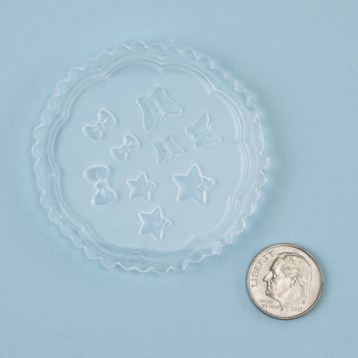 Mini Silicone Jewelry Mold - Bows, Butterflies & Stars with dime