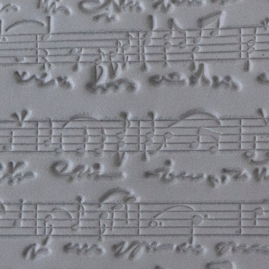 Rollable Texture Tile - Sheet Music sample in gray clay