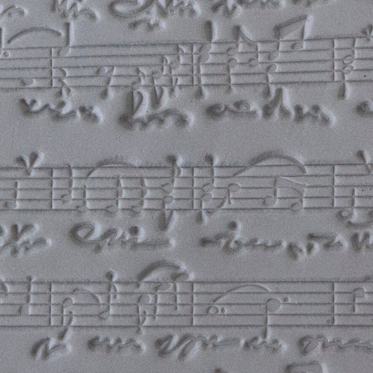 Rollable Texture Tile - Sheet Music sample in gray clay