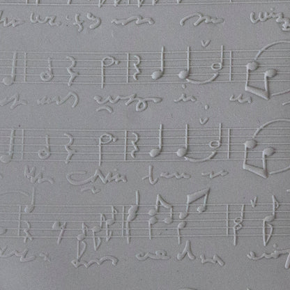 Rollable Texture Tile - Sheet Music Fineline sample in gray clay
