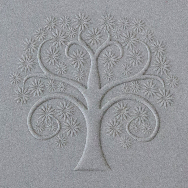 Jewelry Artist Elements - Texture - Tree of Life Embossed sample in gray clay