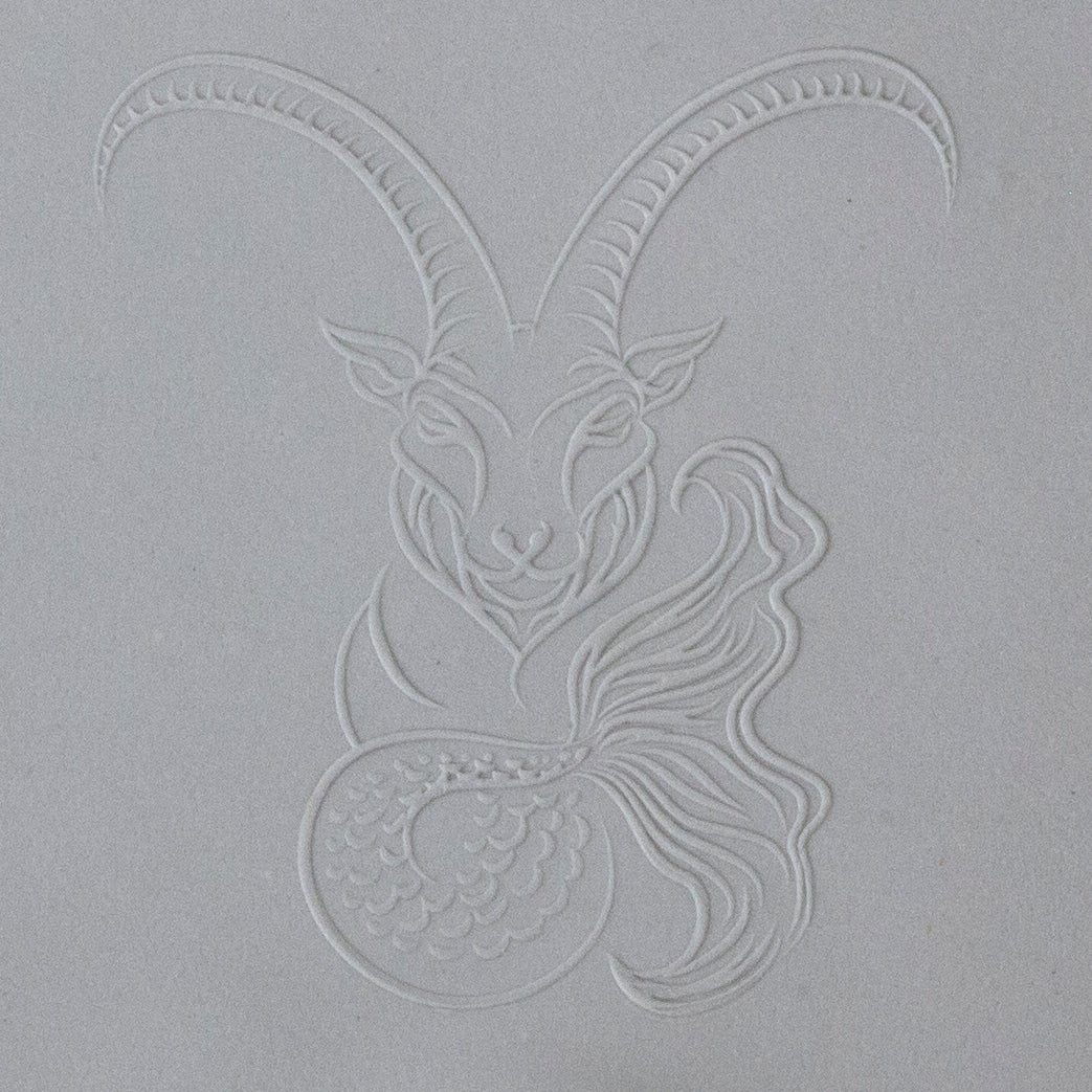 Jewelry Artist Elements - Texture - Astrology - Capricorn sample in gray clay